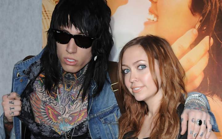 Trace Cyrus posing with his sister Brandi Cyrus